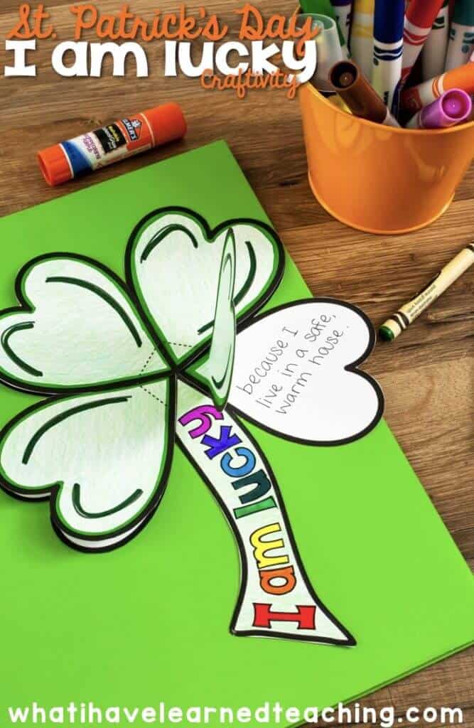 I Am Lucky St. Patrick's Day Craftivity 1 A St. Patrick’s Day Craftivity featuring a large green shamrock with “I am lucky” colored on the stem. One leaf lifts to reveal the handwritten message, Because I have a safe, warm house. Markers and glue are nearby.