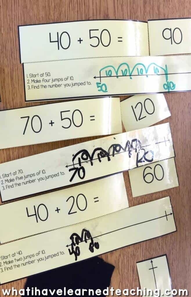 These Two-Digit Addition Math Stations help students use models and addition strategies such as a number line, breaking apart the addends, and base-10 blocks. They are easy to print, laminate, and cut apart and last year after year. This set has students use an open number line to add tens.