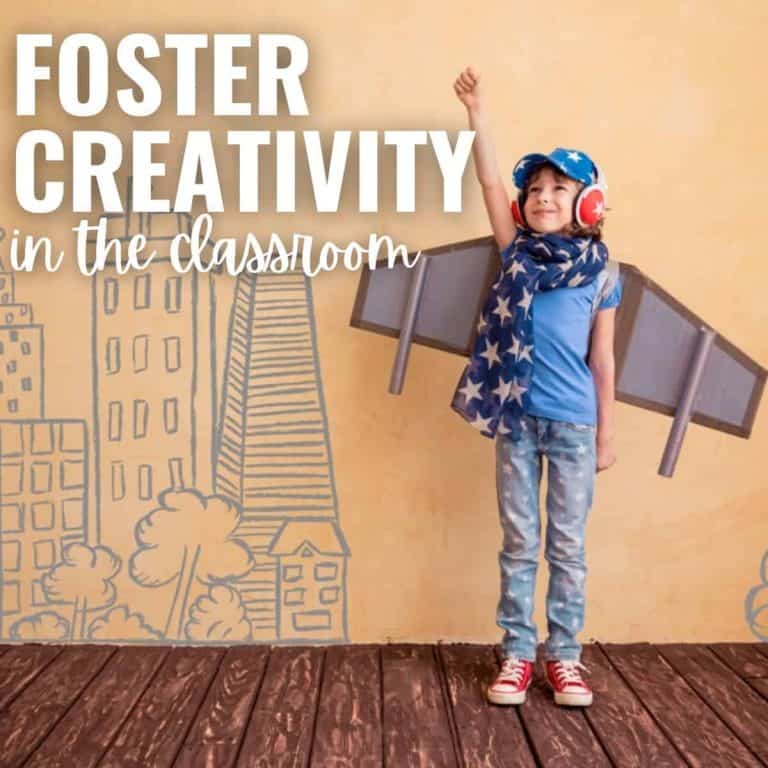 Smiling child wearing a blue outfit, scarf with white stars, and cardboard wings poses with one arm raised. Cityscape drawings on a yellow wall inspire creativity, with text: Foster Creativity in the Classroom.