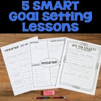 Three “Are you SMART? Goal Setting Lessons” worksheets are spread out on a wooden surface with a pencil and pink eraser below. Above, bold blue text reads: 5 SMART Goal Setting Lessons.