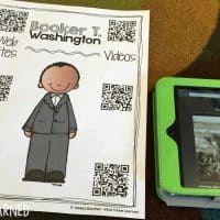 An image of "Using QR Codes in the Classroom4" shows a worksheet with an illustrated figure in a suit and QR codes leading to websites and videos about Booker T. Washington, next to a tablet displaying a related video.