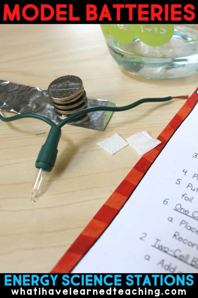 The second Model station has students make a battery cell and model how to create one-cell, two-cell and five-cell batteries to light a bulb.  