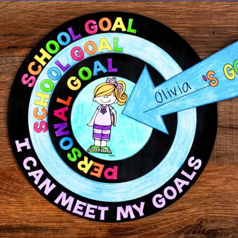 A colorful, circular Goal Setting Craft features the words “SCHOOL GOAL” and “PERSONAL GOAL” around a smiling girl, with a large arrow labeled “Olivia’s Goal” pointing toward her. Text along the edge reads, “I CAN MEET MY GOALS.”.