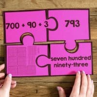Practice place value with these fun number puzzles that are great for math centers.