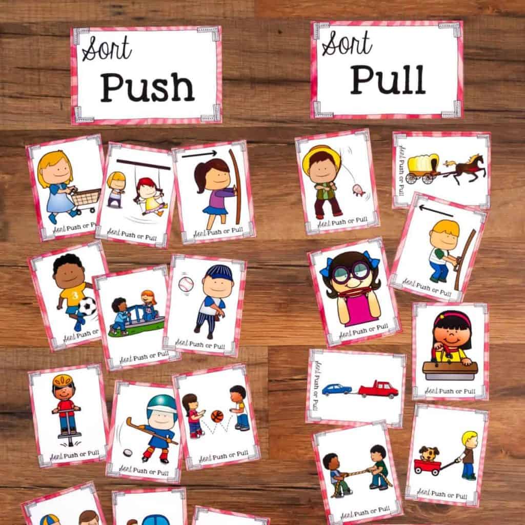A wooden surface displays two labeled sections, Push or Pull Sorting, each with illustrated cards showing push and pull examples, such as children pushing a swing or pulling a wagon.