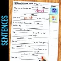 The “Long Vowel Teams AI & AY Worksheets & Activities” includes fill-in-the-blank sentences with words like “paint,” “cry,” and “feat.” Crayons and sticker stamps are placed on top for added fun.