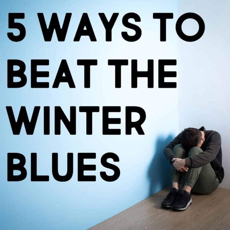 A person sits curled up in a corner, looking down, next to large text that reads, “5 Ways to Beat the Winter Blues,” on a light blue background—perfect for those seeking tips to beat the winter blues.
