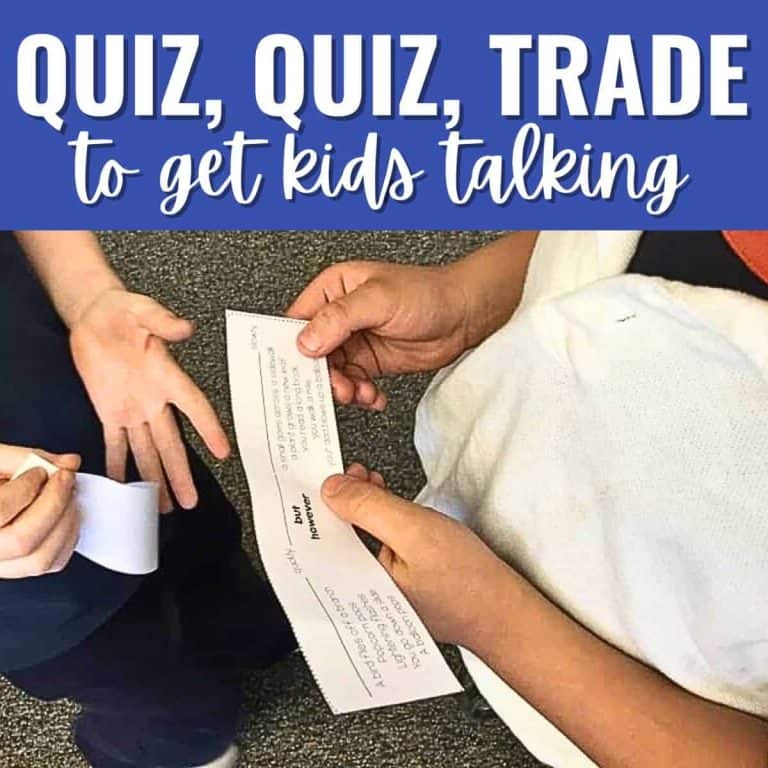 Two children sit facing each other, one with a card showing printed text and the other with a blank card. The image features the words "quiz quiz trade" at the top, encouraging kids to interact and enhance their learning through conversation.