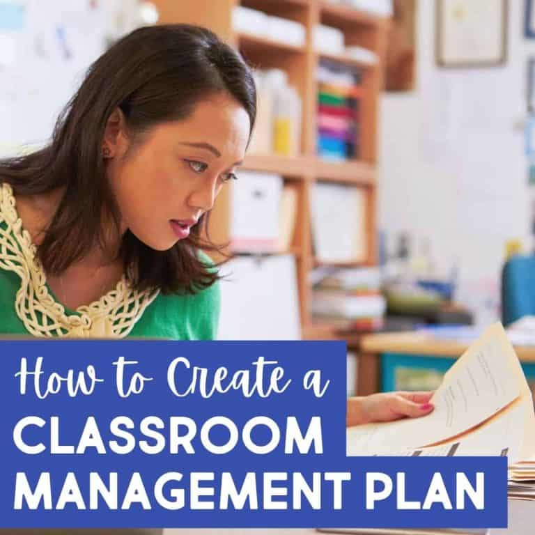 A teacher reviews documents at her desk in a classroom, preparing her classroom management plan. Text overlay reads: How to Create a Classroom Management Plan. Shelves and educational materials are visible in the background.