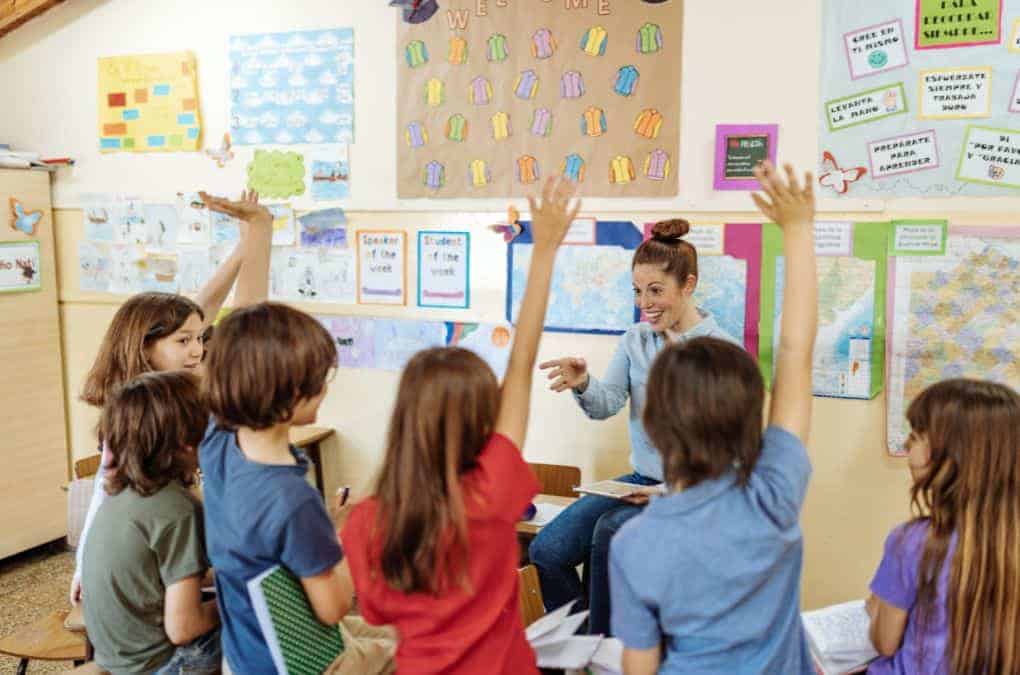 teacher presenting a would you rather question.