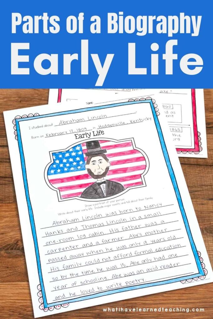 Two biography worksheets about Abraham Lincoln shown on a wooden table. The main worksheet features a drawing of Lincoln in front of an American flag, with handwritten facts about his early life below.