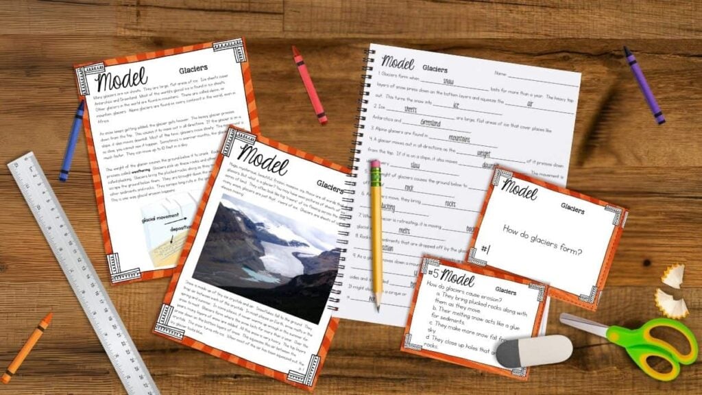 The Glacier erosion reading, featuring activity pages on glacier science and land shaping, is displayed on a wooden table with crayons, a ruler, scissors, an eraser, and seashell decorations.